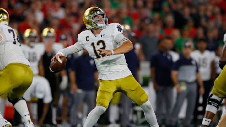 ATHENS, GEORGIA - SEPTEMBER 21: Ian Book #12 of the Notre Dame Fighting Irish throws a first half pass while playing the Georgia Bulldogs at Sanford Stadium on September 21, 2019 in Athens, Georgia. (Photo by Kevin C. Cox/Getty Images)