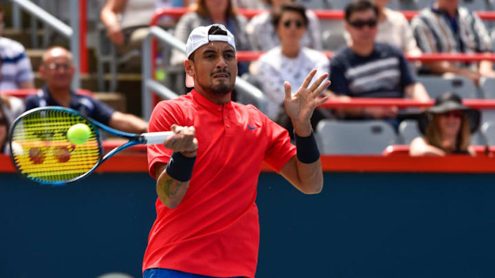 MONTREAL, QC - AUGUST 07: Nick Kyrgios of Australia hits his return against Viktor Troicki of Serbia