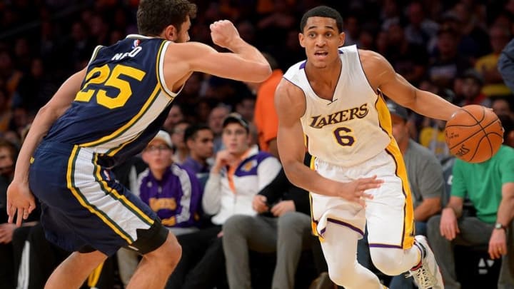 Jan 10, 2016; Los Angeles, CA, USA; Utah Jazz guard Raul Neto (25) guards Los Angeles Lakers guard Jordan Clarkson (6) in the first half of the game at Staples Center. Jazz won 86-74. Mandatory Credit: Jayne Kamin-Oncea-USA TODAY Sports