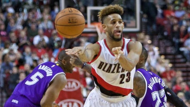 Jan 26, 2016; Portland, OR, USA; Portland Trail Blazers guard Allen Crabbe (23) passes the ball against the Sacramento Kings during the fourth quarter at the Moda Center. Mandatory Credit: Craig Mitchelldyer-USA TODAY Sports