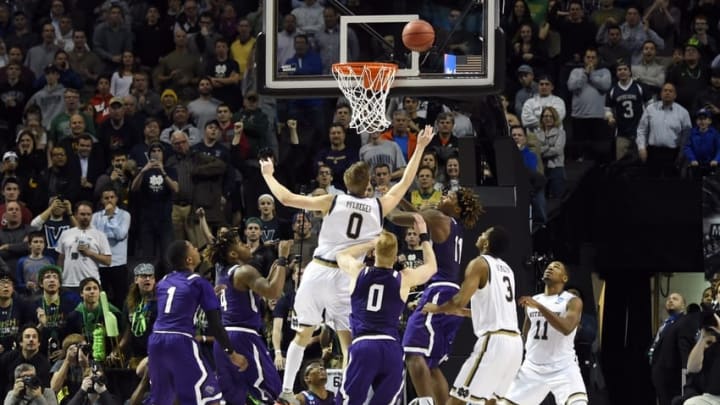 Mar 20, 2016; Brooklyn, NY, USA; Notre Dame Fighting Irish guard Rex Pflueger (0) tips in the winning basket against the Stephen F. Austin Lumberjacks during the second half in the second round of the 2016 NCAA Tournament at Barclays Center. Mandatory Credit: Robert Deutsch-USA TODAY Sports