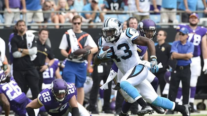 Sep 25, 2016; Charlotte, NC, USA; Carolina Panthers running back Fozzy Whittaker (43) with the ball as Minnesota Vikings free safety Harrison Smith (22) defends in the second quarter at Bank of America Stadium. Mandatory Credit: Bob Donnan-USA TODAY Sports