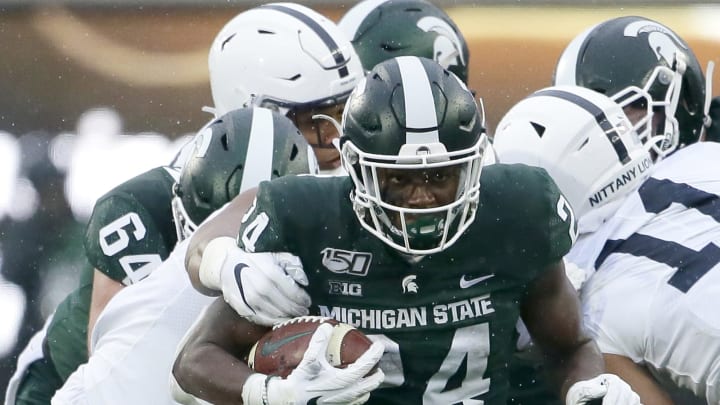 EAST LANSING, MI – OCTOBER 26: Running back Elijah Collins #24 of the Michigan State Spartans carries the ball against the Penn State Nittany Lions during the first half at Spartan Stadium on October 26, 2019 in East Lansing, Michigan. (Photo by Duane Burleson/Getty Images)