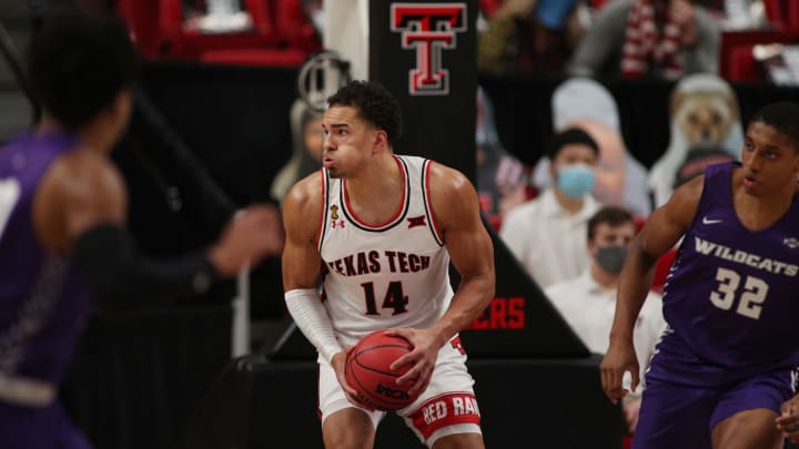 Dec 9, 2020; Lubbock, Texas, USA; Texas Tech Red Raiders forward Marcus Santos-Silva (14) reacts after grabbing a rebound against the Abilene Christian Wildcats in the first half at United Supermarkets Arena. Mandatory Credit: Michael C. Johnson-USA TODAY Sports