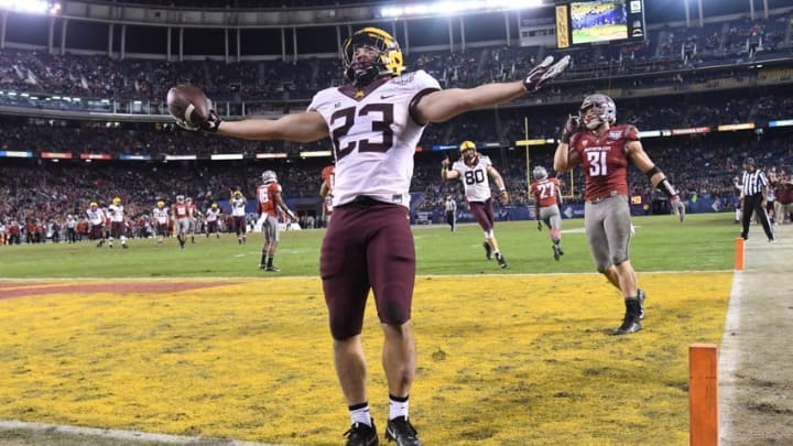 Dec 27, 2016; San Diego , CA, USA; Minnesota Golden Gophers receiver Shannon Brooks (23) celebrates after catching a 13 yard touchdown pass in the third quarter against the Washington State Cougars during the 2016 Holiday Bowl at Qualcomm Stadium. Mandatory Credit: Kirby Lee-USA TODAY Sports
