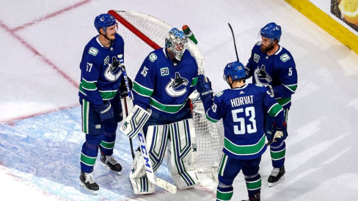EDMONTON, ALBERTA - SEPTEMBER 03: Thatcher Demko #35 of the Vancouver Canucks is congratulated by his teammates after his 4-0 shutout victory against the Vegas Golden Knights in Game Six of the Western Conference Second Round during the 2020 NHL Stanley Cup Playoffs at Rogers Place on September 03, 2020 in Edmonton, Alberta, Canada. (Photo by Bruce Bennett/Getty Images)
