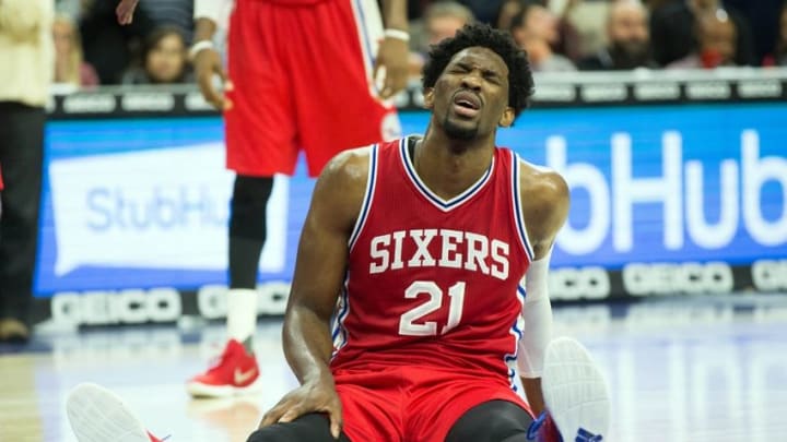 Nov 1, 2016; Philadelphia, PA, USA; Philadelphia 76ers center Joel Embiid (21) reacts after a collision during the second half against the Orlando Magic at Wells Fargo Center. The Orlando Magic won 103-101. Mandatory Credit: Bill Streicher-USA TODAY Sports