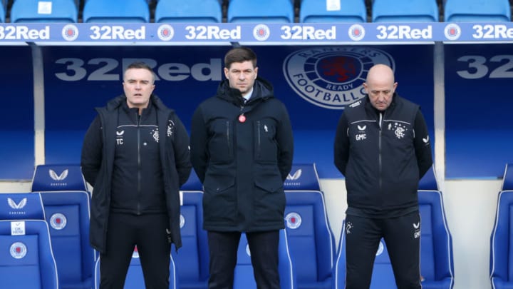 GLASGOW, SCOTLAND - JANUARY 02: Steven Gerrard, Manager of Rangers, Michael Beale, Assistant Manager of Rangers and Gary McAllister, First Team Coach of Rangers stand for a minutes silence in memory of those that lost their lives in the Ibrox disaster prior tothe Ladbrokes Scottish Premiership match between Rangers and Celtic at Ibrox Stadium on January 02, 2021 in Glasgow, Scotland. The match will be played without fans, behind closed doors as a Covid-19 precaution. (Photo by Ian MacNicol/Getty Images)