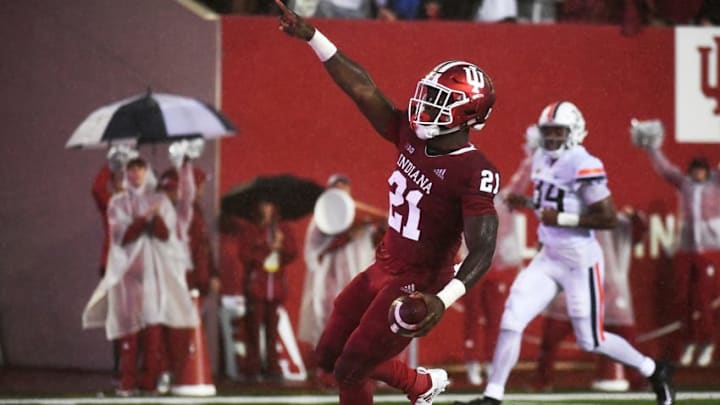 BLOOMINGTON, IN - SEPTEMBER 08: Running back Stevie Scott #21 of the Indiana Hoosiers celebrates after scoring a touchdown during the first quarter of the game against the Virginia Cavaliers at Memorial Stadium on September 8, 2018 in Bloomington, Indiana. (Photo by Bobby Ellis/Getty Images)