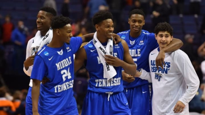 Mar 18, 2016; St. Louis, MO, USA; Middle Tennessee Blue Raiders players celebrate after the game against the against the Michigan State Spartans in the first round in the 2016 NCAA Tournament at Scottrade Center. Middle Tennessee State won 90-81. Mandatory Credit: Jasen Vinlove-USA TODAY Sports