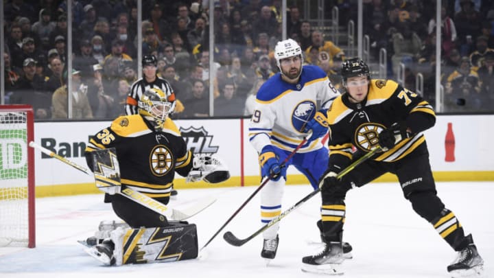 Apr 28, 2022; Boston, Massachusetts, USA; Buffalo Sabres right wing Alex Tuch (89) and Boston Bruins defenseman Charlie McAvoy (73) follow the puck during the first period at TD Garden. Mandatory Credit: Bob DeChiara-USA TODAY Sports