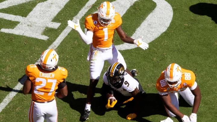 Tennessee defensive back Trevon Flowers (1) celebrates a tackle of Missouri wide receiver Jalen Knox (9) during a SEC conference football game between the Tennessee Volunteers and the Missouri Tigers held at Neyland Stadium in Knoxville, Tenn., on Saturday, October 3, 2020.Kns Ut Football Missouri Bp