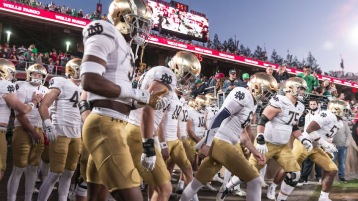 PALO ALTO, CA - NOVEMBER 27: The Notre Dame Fighting Irish football team takes the field before an NCAA football game against the Stanford Cardinal on November 27, 2021 at Stanford Stadium in Palo Alto, California, visible players include Aidan Keanaaina #92, Matt Salerno #29, DJ Brown #2.. (Photo by David Madison/Getty Images)