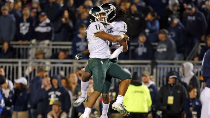 STATE COLLEGE, PA - OCTOBER 13: Felton Davis III #18 of the Michigan State Spartans celebrates with Connor Heyward #11 of the Michigan State Spartans after catching a 25 yard touchdown pass in the fourth quarter against the Penn State Nittany Lions on October 13, 2018 at Beaver Stadium in State College, Pennsylvania. (Photo by Justin K. Aller/Getty Images)