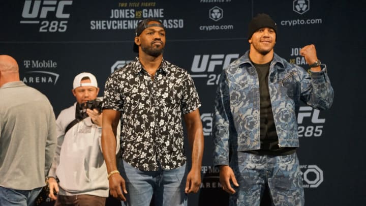 LAS VEGAS, NV - MARCH 2: Jon Jones (L) and Ciryl Gane (R) face off at the UFC 285 press conference on March 1, 2023, at the KA Theatre in Las Vegas, NV. (Photo by Amy Kaplan/Icon Sportswire)