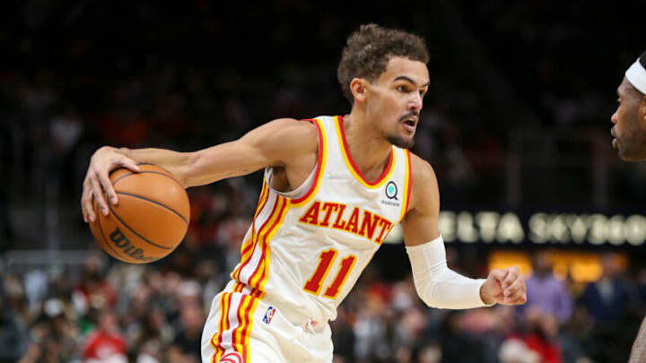 Dec 17, 2021; Atlanta, Georgia, USA; Atlanta Hawks guard Trae Young (11) dribbles against the Denver Nuggets in the second half at State Farm Arena. Mandatory Credit: Brett Davis-USA TODAY Sports