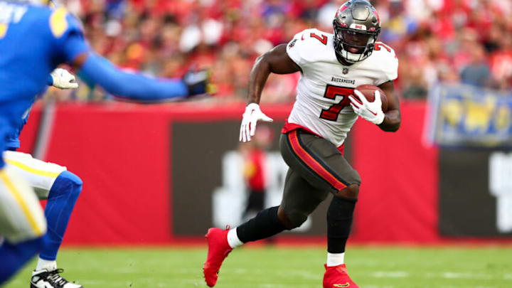 TAMPA, FL - NOVEMBER 6: Leonard Fournette #7 of the Tampa Bay Buccaneers carries the ball during an NFL football game against the Los Angeles Rams at Raymond James Stadium on November 6, 2022 in Tampa, Florida. (Photo by Kevin Sabitus/Getty Images)