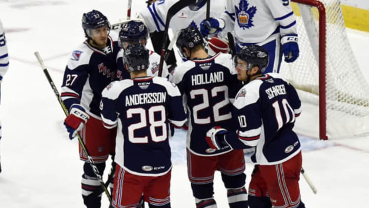 TORONTO, ON – OCTOBER 20: Chris Bigras #27, Lias Andersson #28, Peter Holland, Cole Schneider #10 and Bobby Butler #15 of the Hartford Wolf Pack celebrate a goal against the Toronto Marlies during AHL game action on October 20, 2018 at Coca-Cola Coliseum in Toronto, Ontario, Canada. (Photo by Graig Abel/Getty Images)