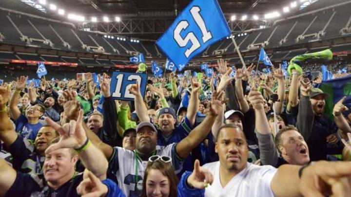 Jan 31, 2015; Phoenix, AZ, USA; Seattle Seahawks fans wave 12th Man flags at the Seattle Seahawks 12Fest fan rally in the Desert at Chase Field prior to Super Bowl XLIX. Mandatory Credit: Kirby Lee-USA TODAY Sports