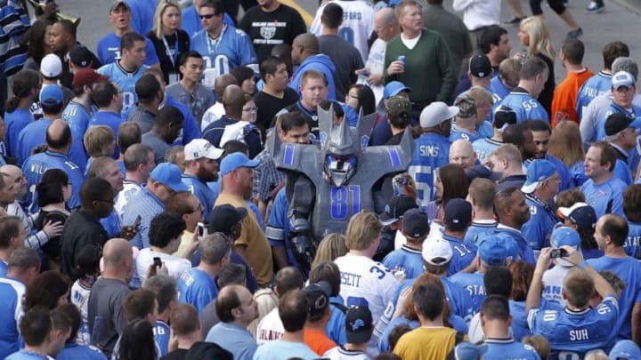 DETROIT - OCTOBER 10: Fans line up to enter Ford Field prior to the start of the game between the Chicago Bears and the Detroit Lions at Ford Field on October 10, 2011 in Detroit, Michigan. (Photo by Leon Halip/Getty Images)