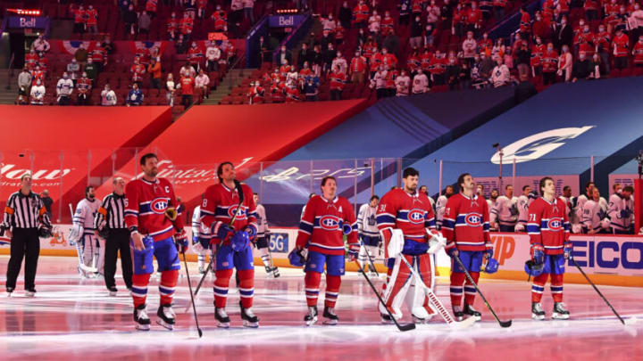 MONTREAL, QC - MAY 29: The Montreal Canadiens stand during the national anthem in front of 2,500 fans prior to the game against the Toronto Maple Leafs in Game Six of the First Round of the 2021 Stanley Cup Playoffs at the Bell Centre on May 29, 2021 in Montreal, Canada. The Montreal Canadiens are the first NHL Canadian team to allow fans inside their venue. (Photo by Minas Panagiotakis/Getty Images)