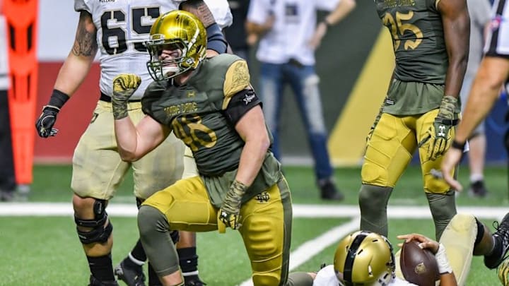 Nov 12, 2016; San Antonio, TX, USA; Notre Dame Fighting Irish linebacker Greer Martini (48) celebrates after tackling Army Black Knights quarterback Chris Carter (7) in the third quarter at the Alamodome. Notre Dame won 44-6. Mandatory Credit: Matt Cashore-USA TODAY Sports