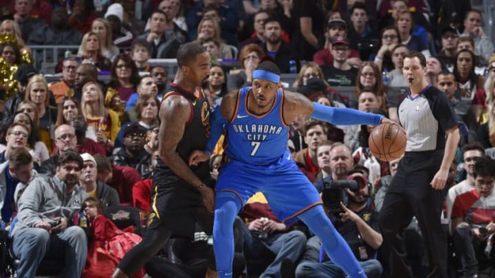 CLEVELAND, OH - JANUARY 20: Carmelo Anthony #7 of the OKC Thunder handles the ball against JR Smith #5 of the Cleveland Cavaliers on January 20, 2018 at Quicken Loans Arena in Cleveland, Ohio. Copyright 2018 NBAE (Photo by David Liam Kyle/NBAE via Getty Images)