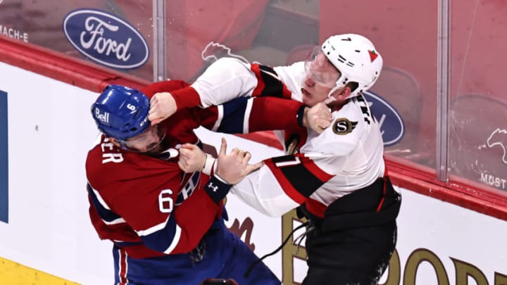 Apr 3, 2021; Montreal, Quebec, CAN; Montreal Canadiens defenseman Shea Weber (6) and Ottawa Senators left wing Brady Tkachuk (7) fight during the first period at Bell Centre. Mandatory Credit: Jean-Yves Ahern-USA TODAY Sports