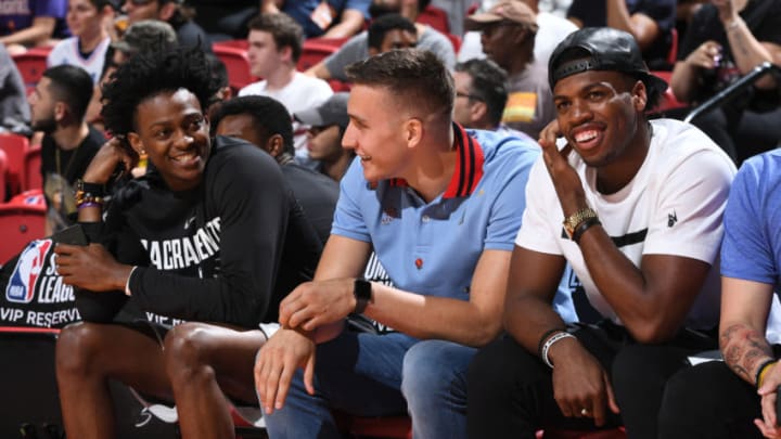 LAS VEGAS, NV - JULY 7: De'Aaron Fox #5, Bogdan Bogdanovic #8, and Buddy Hield #24 of the Sacramento Kings attend the game against the Phoenix Suns during the 2018 Las Vegas Summer League on July 7, 2018 at the Thomas & Mack Center in Las Vegas, Nevada. NOTE TO USER: User expressly acknowledges and agrees that, by downloading and/or using this Photograph, user is consenting to the terms and conditions of the Getty Images License Agreement. Mandatory Copyright Notice: Copyright 2018 NBAE (Photo by Garrett Ellwood/NBAE via Getty Images)
