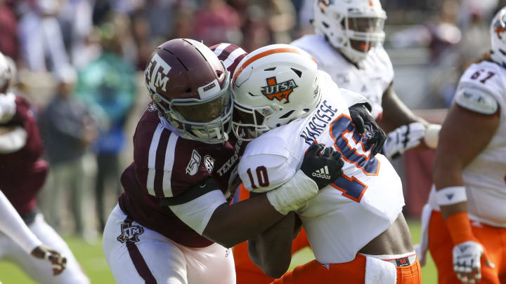 Nov 2, 2019; College Station, TX, USA; UTSA Roadrunners quarterback Lowell Narcisse (10) is sacked by Texas A&M Aggies defensive lineman DeMarvin Leal (8) during the first quarter at Kyle Field. Mandatory Credit: John Glaser-USA TODAY Sports