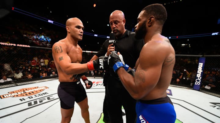 ATLANTA, GA - JULY 30: (L-R) Robbie Lawler and Tyron Woodley touch gloves in their welterweight championship bout during the UFC 201 event on July 30, 2016 at Philips Arena in Atlanta, Georgia. (Photo by Jeff Bottari/Zuffa LLC/Zuffa LLC via Getty Images)