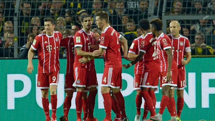 DORTMUND, GERMANY - NOVEMBER 4: Robert Lewandowski celebrates after scoring his team`s second goal with team mates during the German Bundesliga match between Borussia Dortmund v Bayern Munchen at the Signal Iduna Park on November 4, 2017 in Dortmund Germany. (Photo by TF-Images/TF-Images via Getty Images)