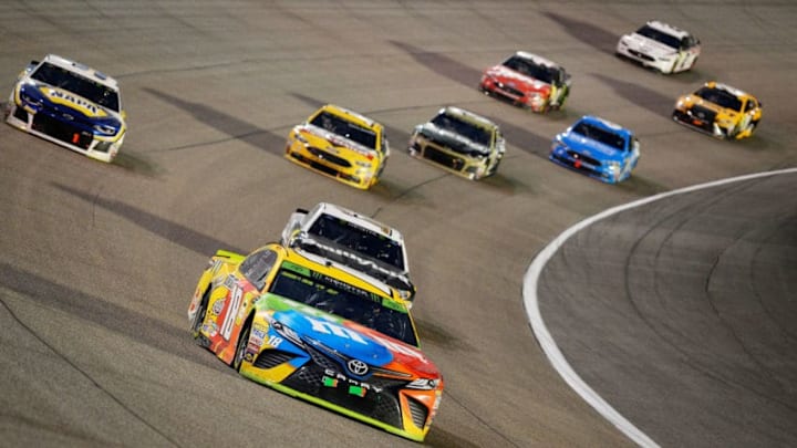 HOMESTEAD, FL - NOVEMBER 18: Kyle Busch, driver of the #18 M&M's Toyota, leads a pack of cars during the Monster Energy NASCAR Cup Series Ford EcoBoost 400 at Homestead-Miami Speedway on November 18, 2018 in Homestead, Florida. (Photo by Robert Laberge/Getty Images)