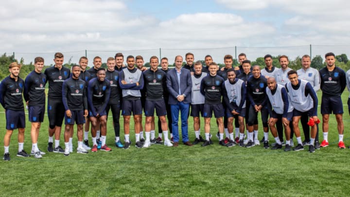 LEEDS, ENGLAND - JUNE 7: Prince William, Duke of Cambridge poses with the England players including Captain Harry Kane (C) as he attends the Facility at the FA Training Ground to meet the England Squad before their match at Elland Road this Evening on June 7, 2018 in Leeds, England. (Photo by Charlotte Graham-WPA-Pool/Getty Images)