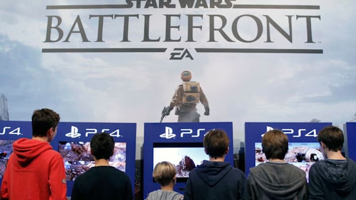 PARIS, FRANCE - OCTOBER 28: Visitors play a video game 'Star Wars Battlefront' published by Pandemic Studios on a gaming console 'playstation PS4'at the Paris Game Week, a trade fair for video games on October 28, 2015 in Paris, France. Paris Game week will run from October 28 until November 1, 2015. (Photo by Chesnot/Getty Images)