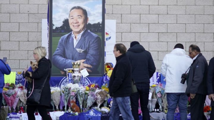 LEICESTER, ENGLAND - OCTOBER 29: Fans and mourners pay their respects to Leicester City owner Vichai Srivaddhanaprabha who died in a helicopter crash at at Leicester City Football Club's King Power Stadium, on October 28, 2018 in Leicester, England. The owner of Leicester City Football Club, Vichai Srivaddhanaprabha, was among the five people who died in the helicopter crash on Saturday evening after the club's game against West Ham. (Photo by Christopher Furlong/Getty Images)
