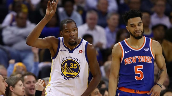 OAKLAND, CA – JANUARY 23: Kevin Durant #35 of the Golden State Warriors reacts after making a basket over Courtney Lee #5 of the New York Knicks at ORACLE Arena on January 23, 2018 in Oakland, California. NOTE TO USER: User expressly acknowledges and agrees that, by downloading and or using this photograph, User is consenting to the terms and conditions of the Getty Images License Agreement. (Photo by Ezra Shaw/Getty Images)