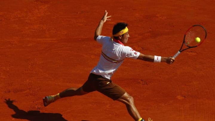 MONTE-CARLO, MONACO - APRIL 22: Kei Nishikori of Japan plays a backhand in his match against Rafael Nadal of Spain during day eight of ATP Masters Series: Monte Carlo Rolex Masters at Monte-Carlo Sporting Club on April 22, 2018 in Monte-Carlo, Monaco. (Photo by Julian Finney/Getty Images)