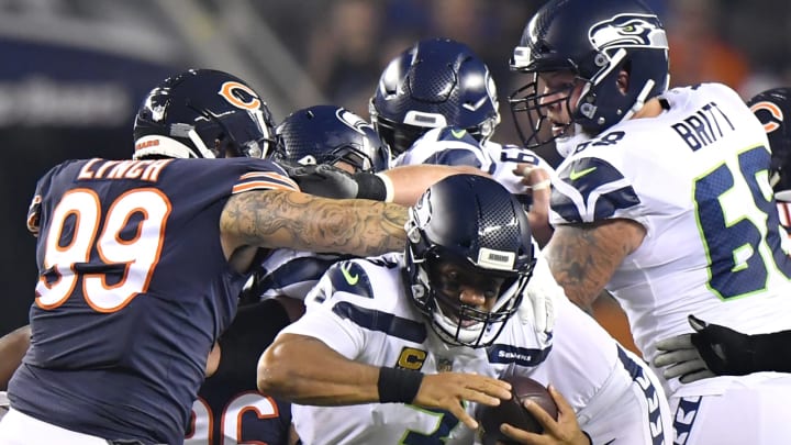 CHICAGO, IL – SEPTEMBER 17: Quarterback Russell Wilson #3 of the Seattle Seahawks carries the football against the Chicago Bears in the first half at Soldier Field on September 17, 2018 in Chicago, Illinois. (Photo by Quinn Harris/Getty Images)