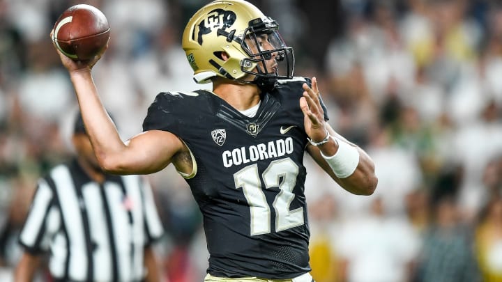 DENVER, CO – AUGUST 30: Quarterback Steven Montez #12 of the Colorado Buffaloes passes against the Colorado State Rams in the fourth quarter of a game at Broncos Stadium at Mile High on August 30, 2019 in Denver, Colorado. (Photo by Dustin Bradford/Getty Images)
