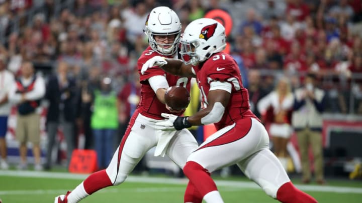 GLENDALE, AZ - SEPTEMBER 30: Quarterback Josh Rosen #3 of the Arizona Cardinals hands the ball off to running back David Johnson #31 of the Cardinals during an NFL game against the Seattle Seahawks at State Farm Stadium on September 30, 2018 in Glendale, Arizona. (Photo by Ralph Freso/Getty Images)