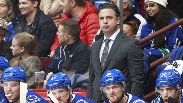 VANCOUVER, BC - NOVEMBER 18: Head coach Travis Green of the Vancouver Canucks looks on from the bench during their NHL game against the St. Louis Blues at Rogers Arena November 18, 2017 in Vancouver, British Columbia, Canada. (Photo by Jeff Vinnick/NHLI via Getty Images)'n