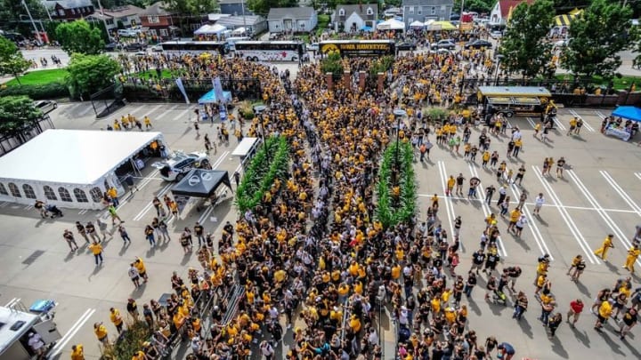 Sep 3, 2016; Iowa City, IA, USA; Fans line the streets as the Iowa Hawkeyes arrive for their game against the Miami (Oh) Redhawks at Kinnick Stadium. Mandatory Credit: Jeffrey Becker-USA TODAY Sports