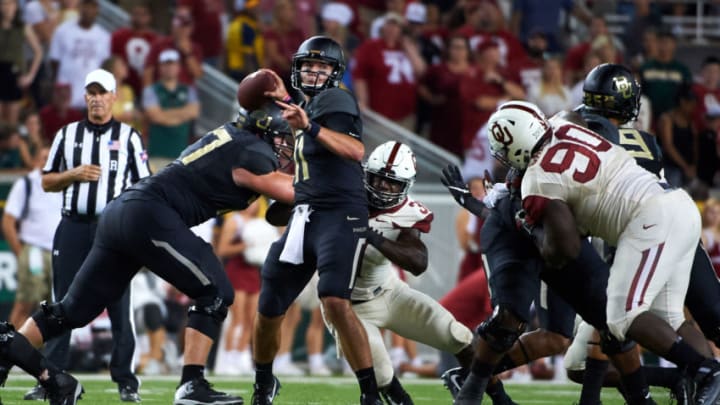 WACO, TX - SEPTEMBER 23: Zach Smith #11 of the Baylor Bears drops back to pass against the Oklahoma Sooners during the second half at McLane Stadium on September 23, 2017 in Waco, Texas. (Photo by Cooper Neill/Getty Images)