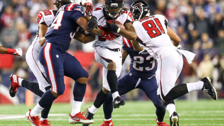 FOXBORO, MA - OCTOBER 22: Devonta Freeman #24 of the Atlanta Falcons carries the ball during the second quarter of a game against the New England Patriots at Gillette Stadium on October 22, 2017 in Foxboro, Massachusetts. (Photo by Maddie Meyer/Getty Images)