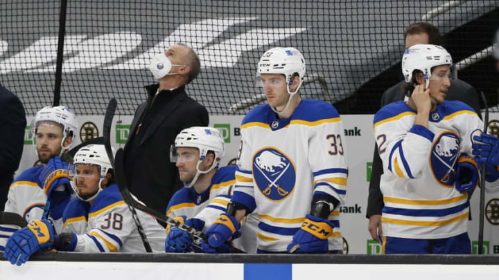 Mar 27, 2021; Boston, Massachusetts, USA; Buffalo Sabres head coach Ralph Krueger looks up towards the clock during the final moments of their 3-2 loss to the Boston Bruins at TD Garden. Mandatory Credit: Winslow Townson-USA TODAY Sports