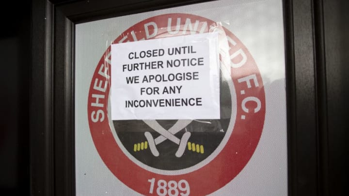 SHEFFIELD, ENGLAND - 14 MARCH - A notice saying to fans saying the club is closed until further notice at Bramall Lane home of Sheffield United on March 14, 2020 in Sheffield, England. The coronavirus has led to the suspension of all English football matches until at least April 3rd (Photo by Ben Early - AMA/Getty Images)