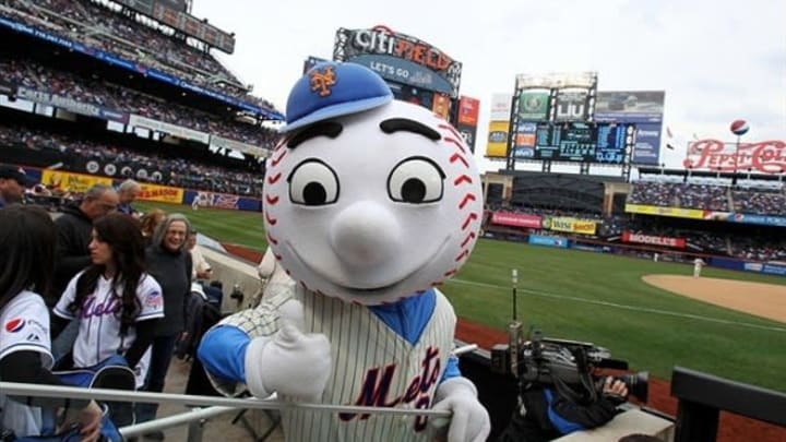Apr 1, 2013; New York, NY, USA; Mr. Met gives a thumbs-up during the seventh inning of a MLB opening day game between the New York Mets and the San Diego Padres at Citi Field. Mandatory Credit: Brad Penner-USA TODAY Sports