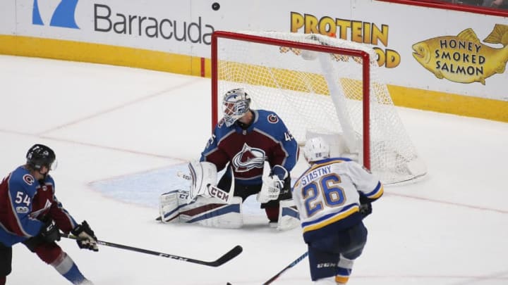 DENVER, CO - OCTOBER 19: Colorado Avalanche goalie Jonathan Bernier (45) looks back as St. Louis Blues center Paul Stastny (26) shoots just wide during a regular season game between the Colorado Avalanche and the visiting St. Louis Blues on October 19, 2017, at the Pepsi Center in Denver, CO. (Photo by Russell Lansford/Icon Sportswire via Getty Images)