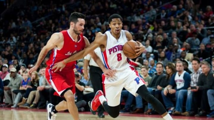 Nov 26, 2014; Auburn Hills, MI, USA; Detroit Pistons guard Spencer Dinwiddie (8) drives to the basket against Los Angeles Clippers guard J.J. Redick (4) during the fourth quarter at The Palace of Auburn Hills. Los Angeles won 104-98. Mandatory Credit: Tim Fuller-USA TODAY Sports